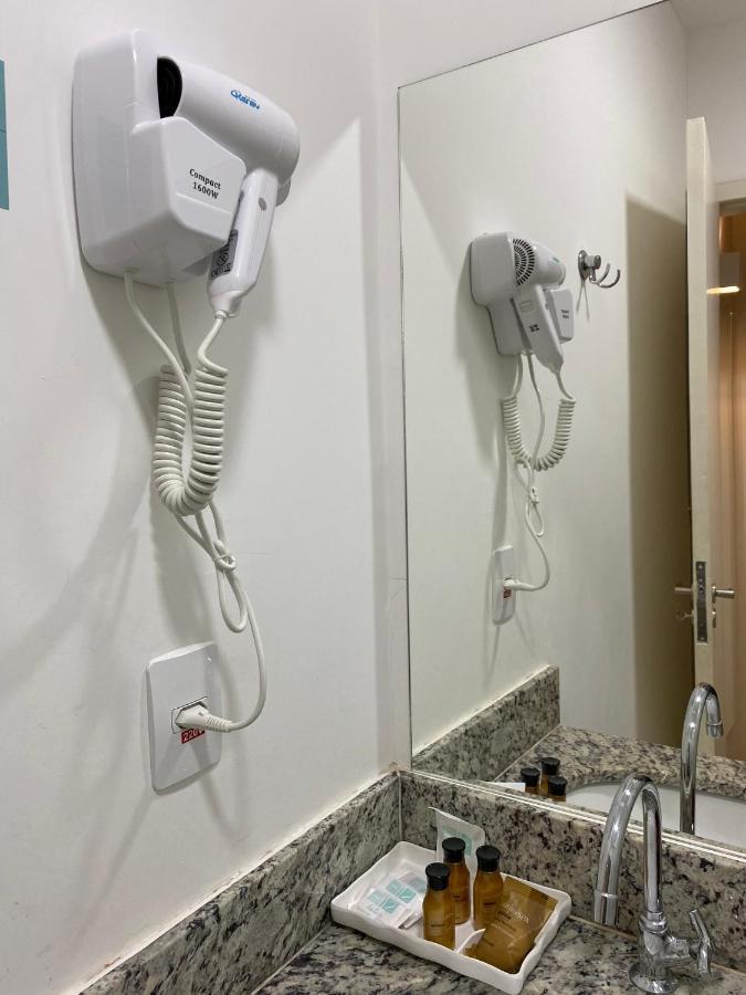 Hotel H2 Congonhas 외부 사진 A hair dryer in a hotel room